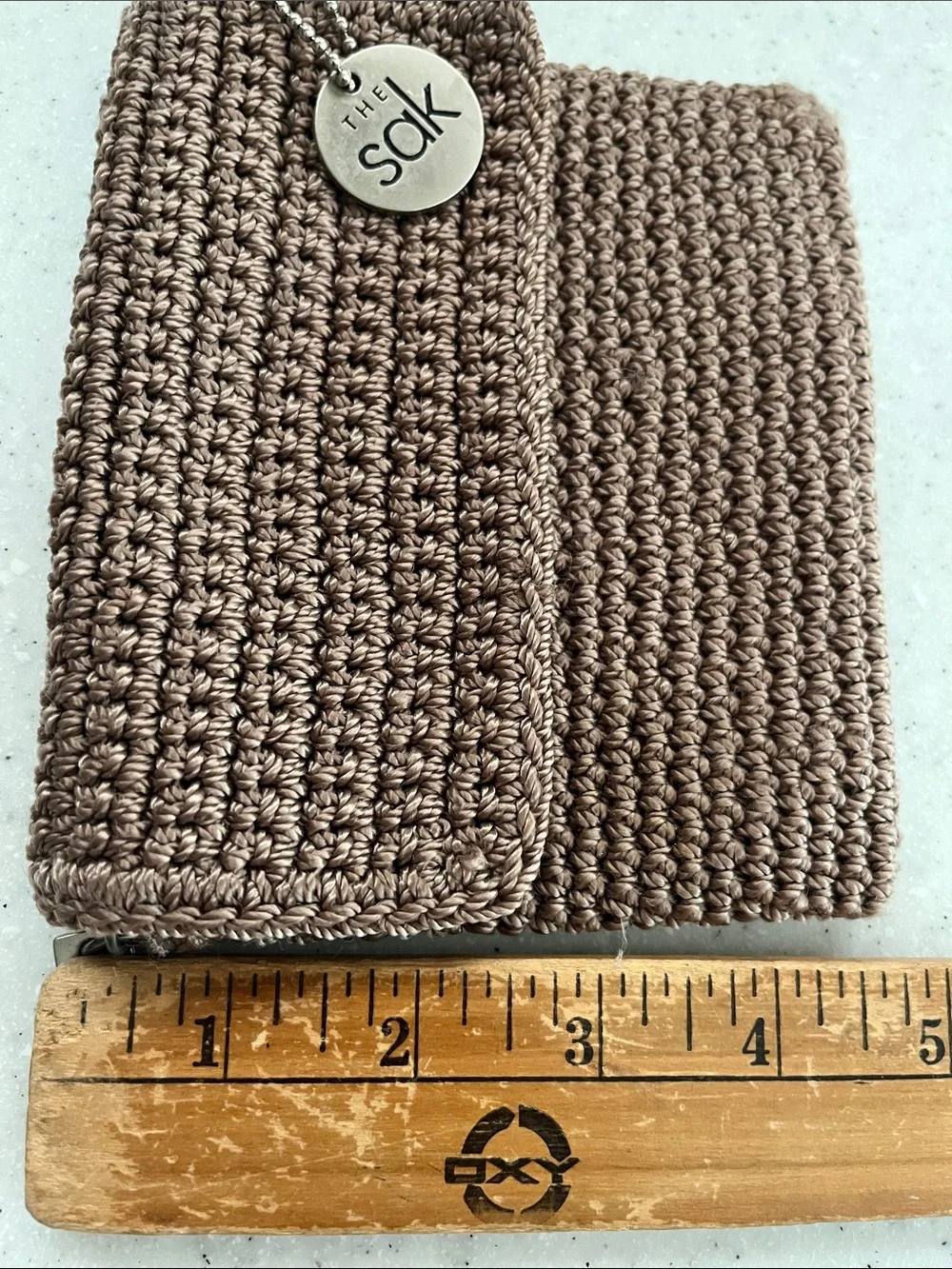 The SAK Taupe Crochet Zippered Cosmetic/Catch All Pouch/Bag Zip Closure